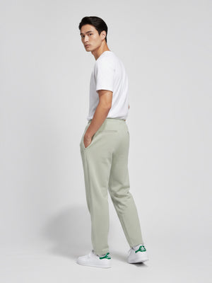 Model wearing FTFO || BIG BRAND LOW PRICE Adidas Basketball One VLR ST velour straight leg pants in light green
