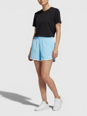 Wanita mengenakan celana lari Adidas M20 Short berwarna biru muda dengan detail putih dari FTFO || BIG BRAND LOW PRICE