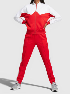 Model wanita mengenakan jaket track Adidas W Tiro CB TT berwarna merah putih dengan celana senada dari FTFO || BIG BRAND LOW PRICE