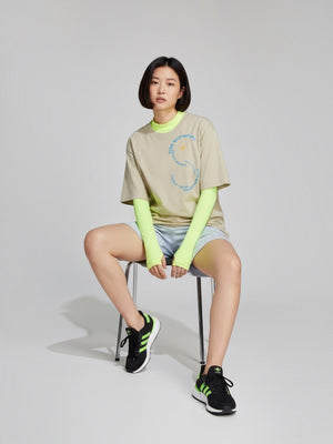 FTFO || BIG BRAND LOW PRICE oversized beige organic cotton t-shirt with neon yellow long sleeves and graphic logo