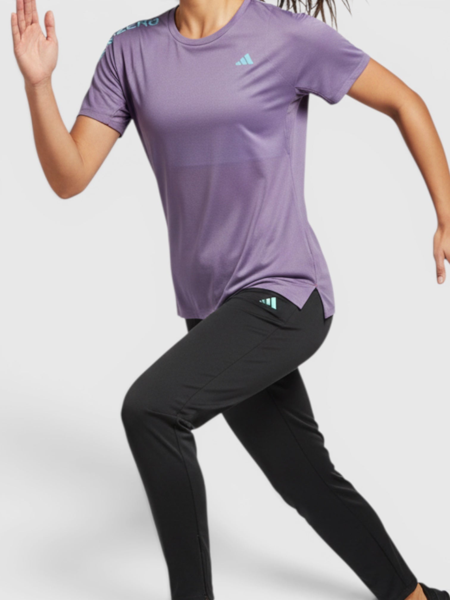 FTFO || BIG BRAND LOW PRICE Adidas Adizero purple running tee on a female runner with black pants and headband