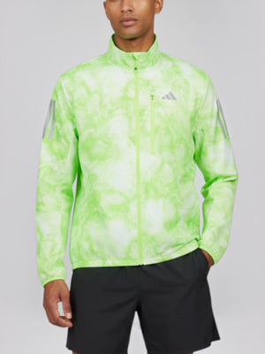 Male model wearing FTFO || BIG BRAND LOW PRICE Adidas Own the Run windproof running jacket in neon green tie-dye