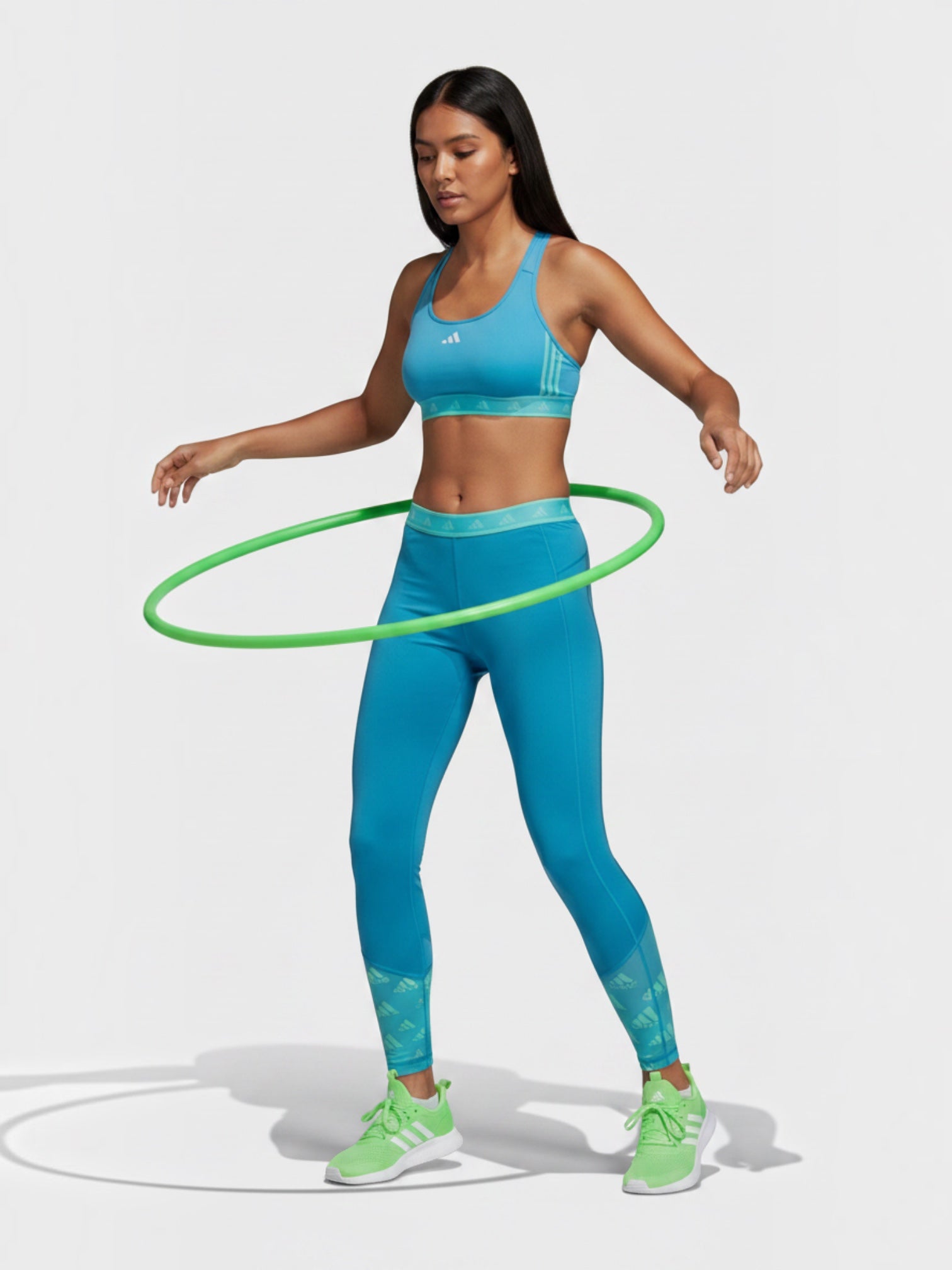 FTFO || BIG BRAND LOW PRICE Adidas Hyperglam medium-support sports bra in blue with racerback and mesh panels