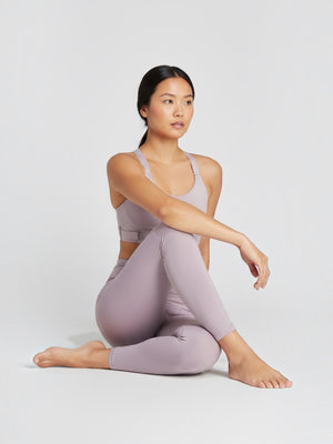 FTFO || BIG BRAND LOW PRICE Adidas FastImpact Luxe high-support sports bra in light purple worn by a model.