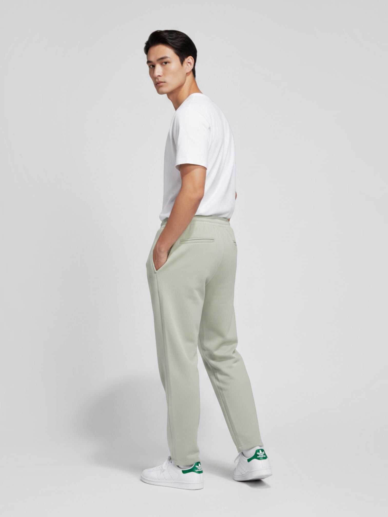 Model wearing FTFO || BIG BRAND LOW PRICE Adidas Basketball One VLR ST velour straight leg pants in light green