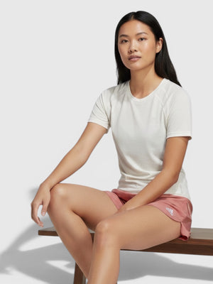 FTFO || BIG BRAND LOW PRICE Adidas XCITY running tee in off-white with raglan sleeves worn by a female model.