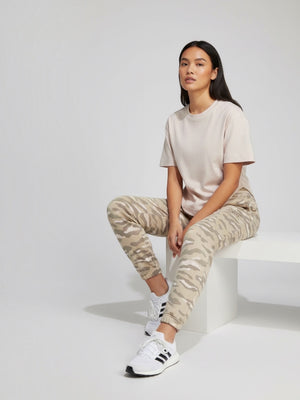 FTFO || BIG BRAND LOW PRICE Adidas by Stella McCartney organic cotton beige t-shirt with curved hem on a model