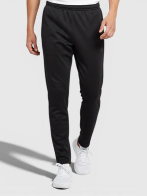 Model pria mengenakan celana olahraga Adidas W Tiro berwarna hitam dengan potongan ramping dari FTFO || BIG BRAND LOW PRICE