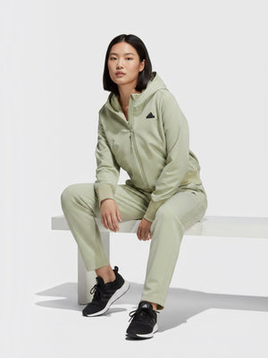 Model wanita mengenakan jaket hoodie Adidas Z.N.E. Woven Full-Zip berwarna hijau sage dari FTFO || BIG BRAND LOW PRICE