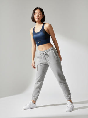 Model wearing FTFO || BIG BRAND LOW PRICE Adidas x Marimekko navy blue medium-support racerback sports bra